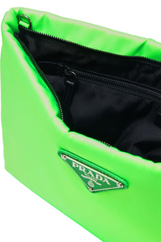 Neon green Prada tote bag, close-up of triangle logo and open zip