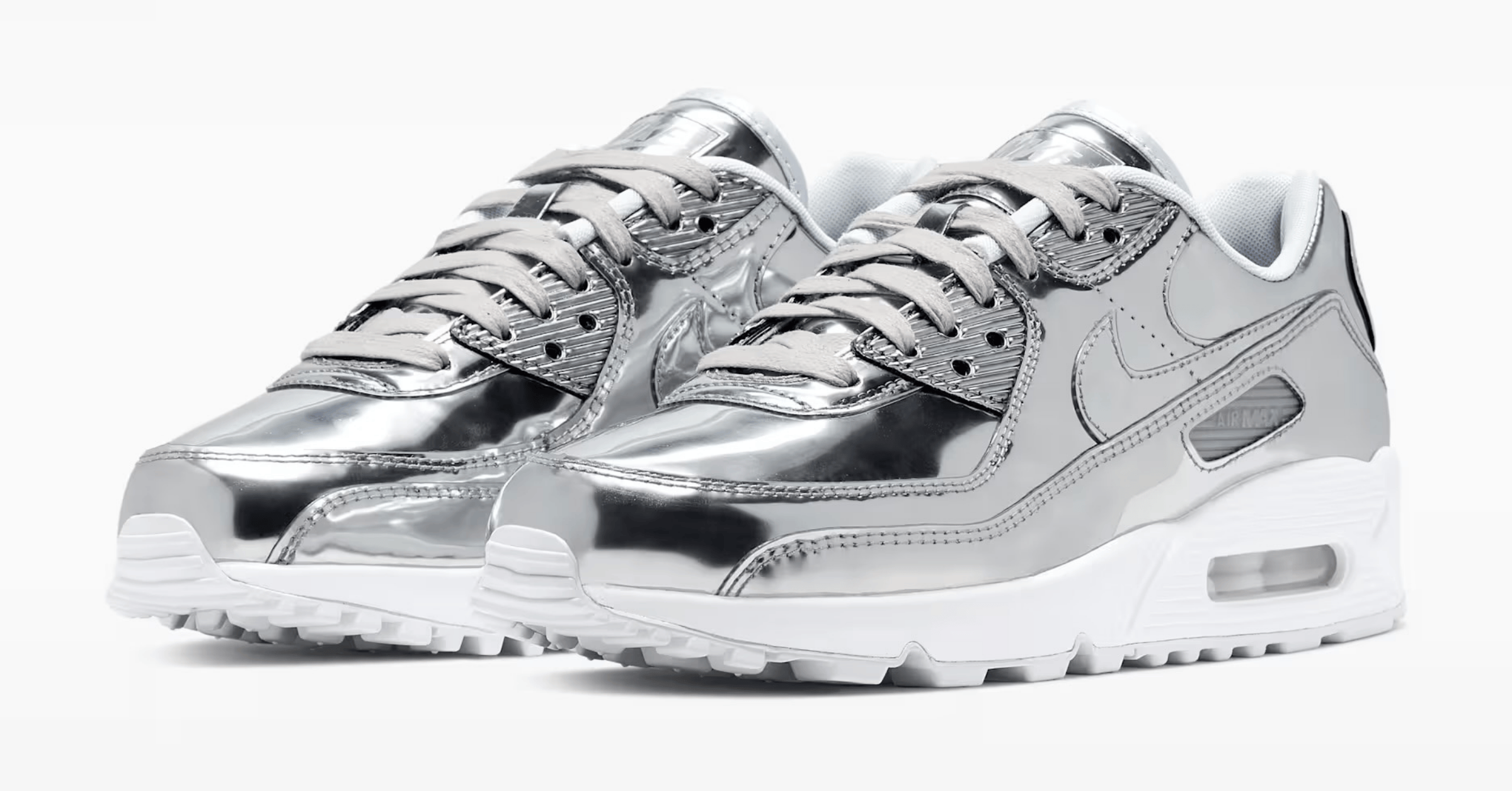 an image of a studio shot pair of the air max 90 chrome