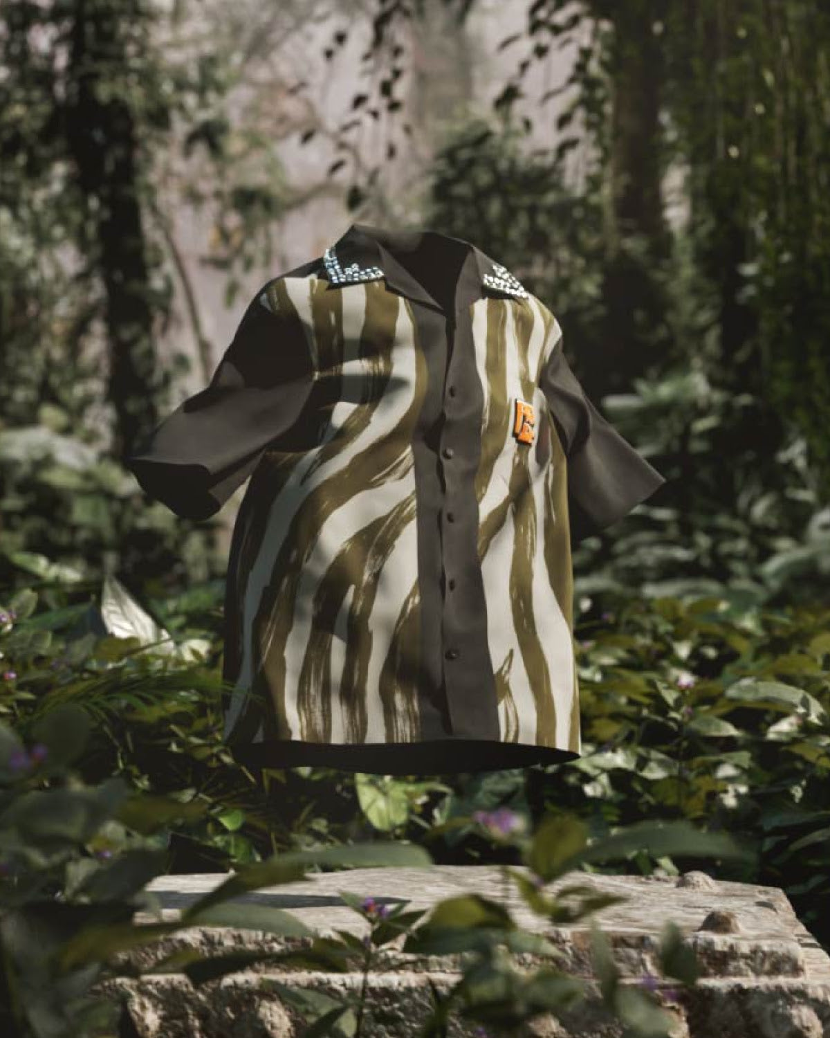 A prada timecapsule shirt floating in the air 