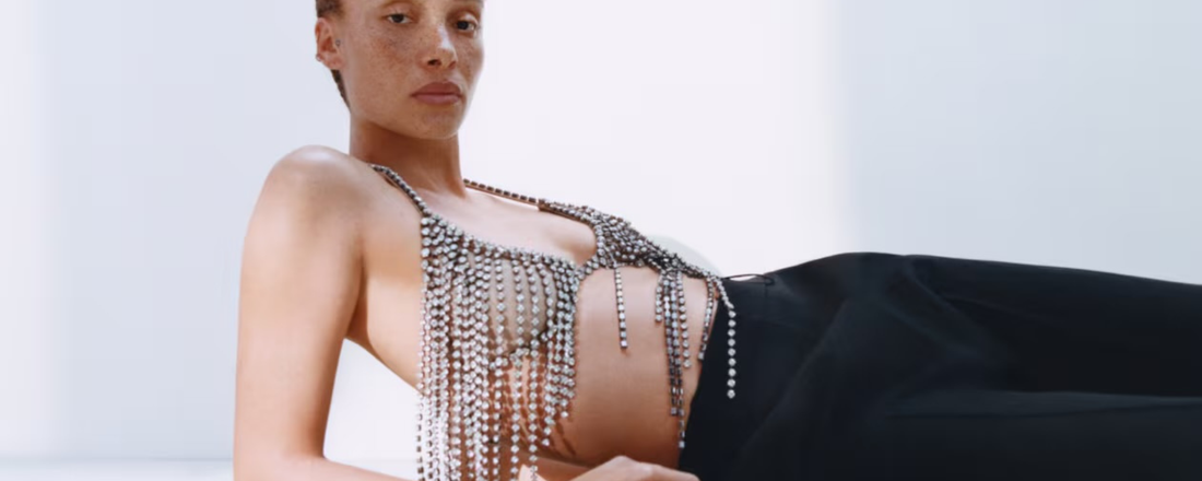 a model wearing a crystall embellished bra from the Stella McCartney x H&M Collection