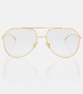 Gold-framed eyeglasses on a white background