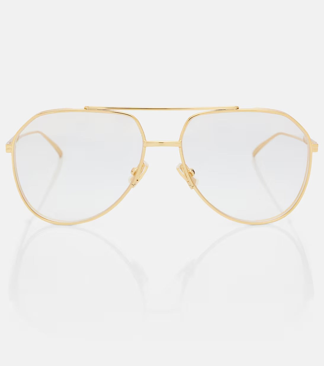 Gold-framed eyeglasses on a white background