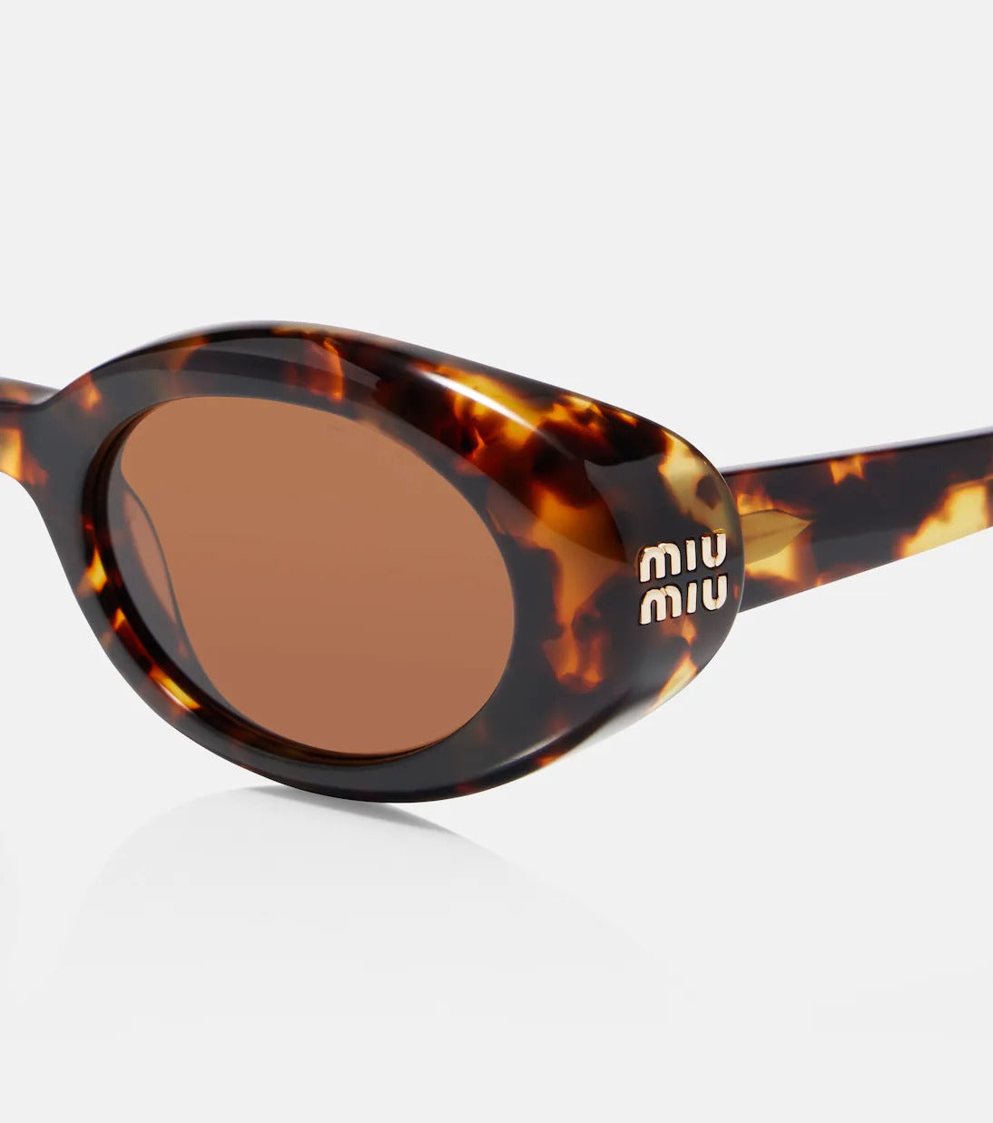 Miu Miu Logo Oval Sunglasses in Tortoiseshell