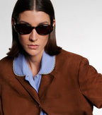 Miu Miu Logo Oval Sunglasses in Tortoiseshell