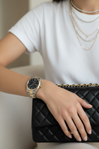 Net-a-Porter sharp — Rolex, white tee, tennis necklaces, Chanel bag