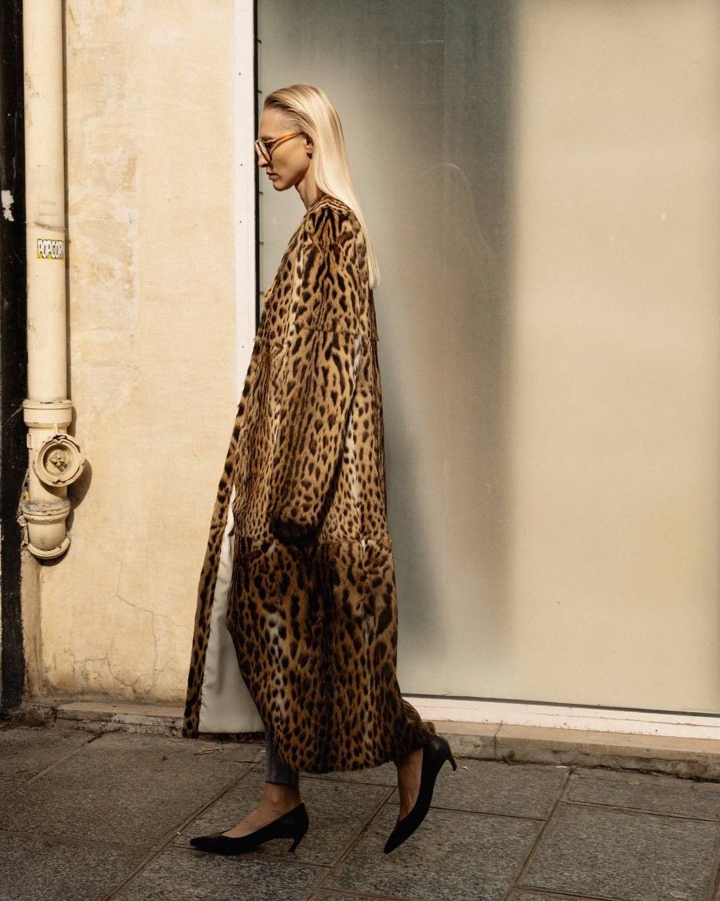 Street-style reference: an ankle-length leopard coat worn with black kitten heels