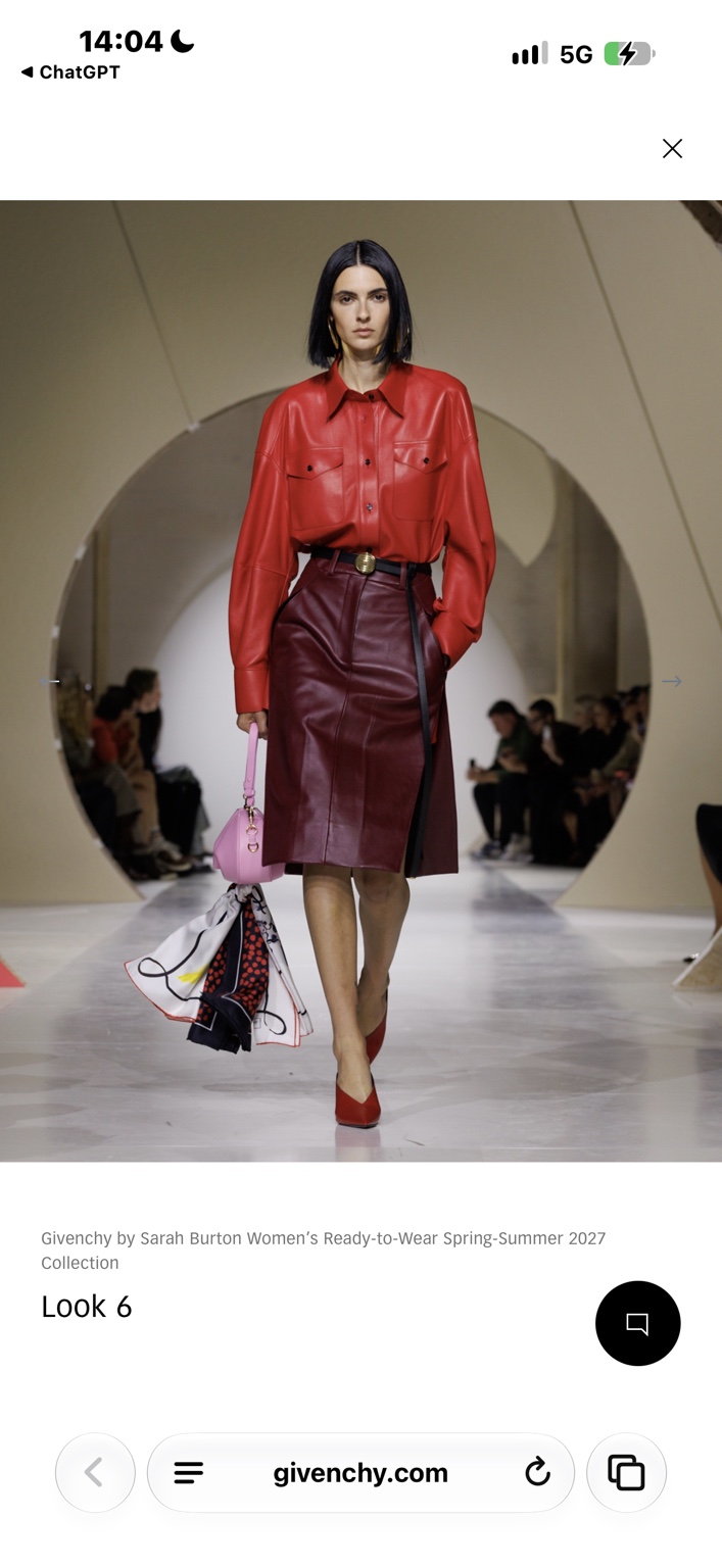 Red leather shirt and burgundy leather pencil skirt with a pink bag