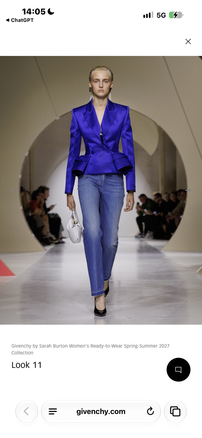 Electric-blue satin fitted jacket worn with blue jeans
