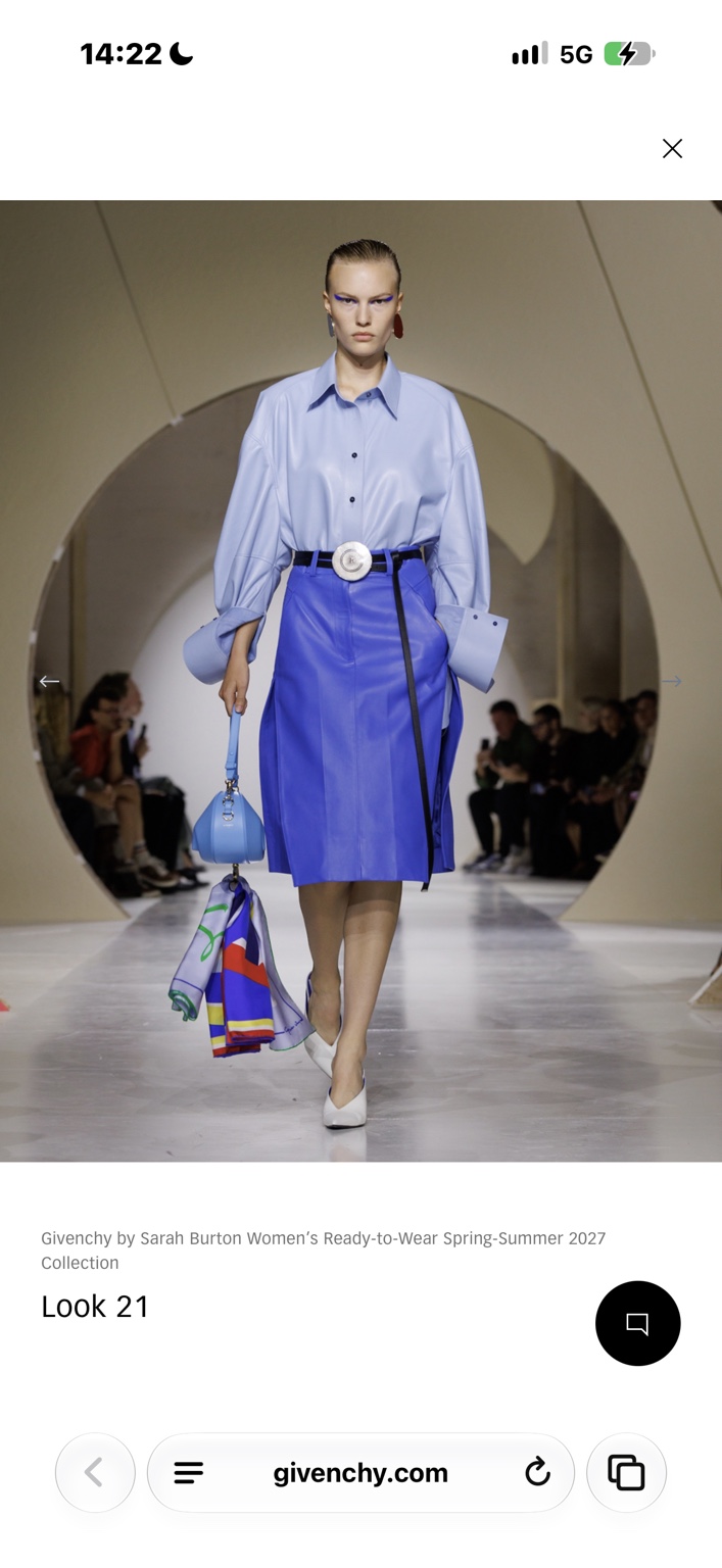 Blue poplin shirt with violet leather skirt and disc belt