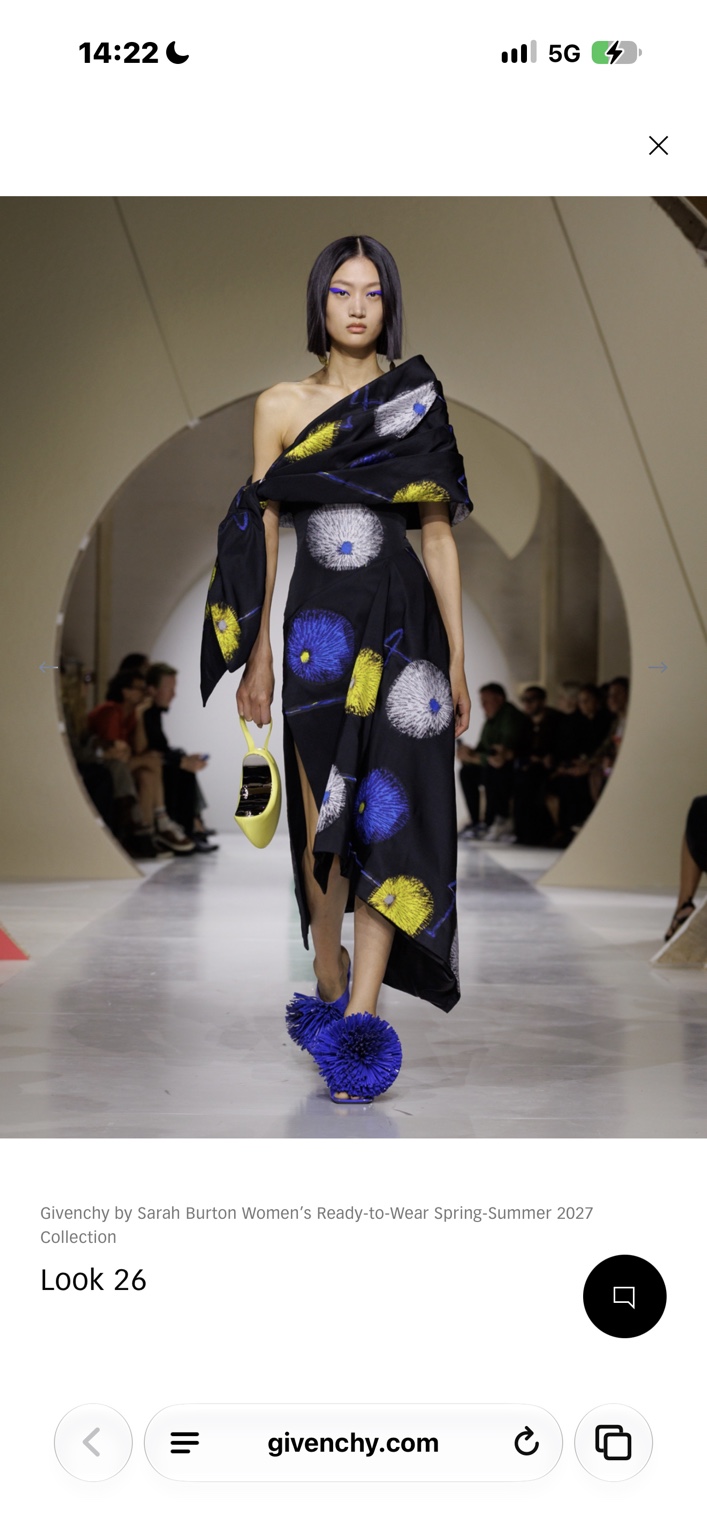 Asymmetric floral wrap dress with blue pom-pom shoes