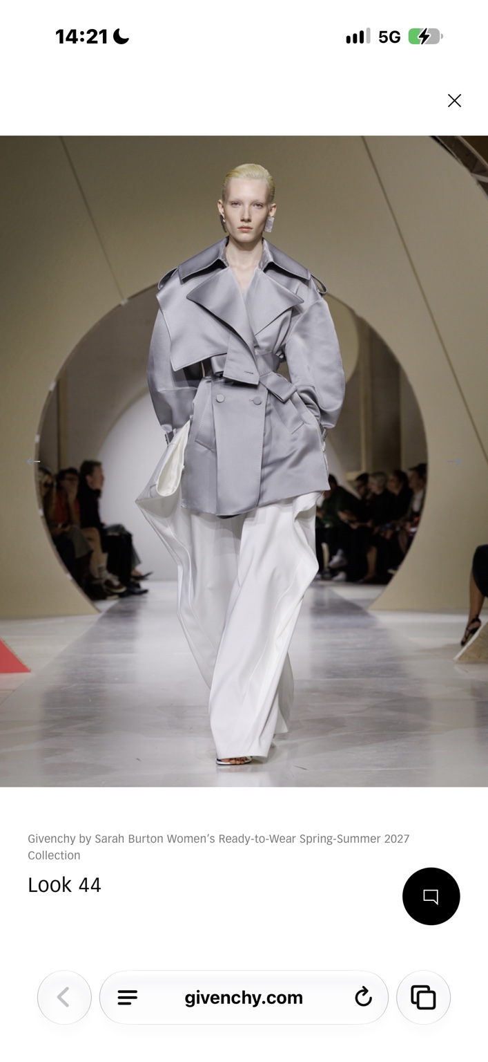 Pale silver satin trench jacket with wide white trousers
