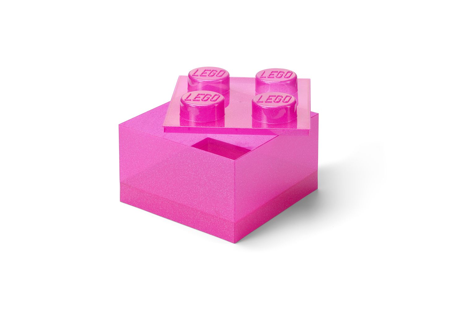 Translucent pink LEGO brick-shaped storage box with its lid raised