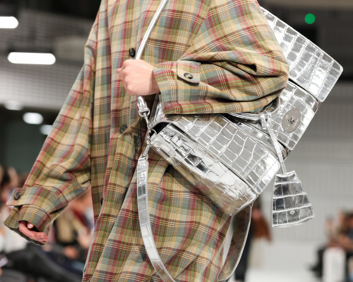 Silver croc-effect Mulberry bag worn with a plaid coat at Christopher Kane’s debut show for the house