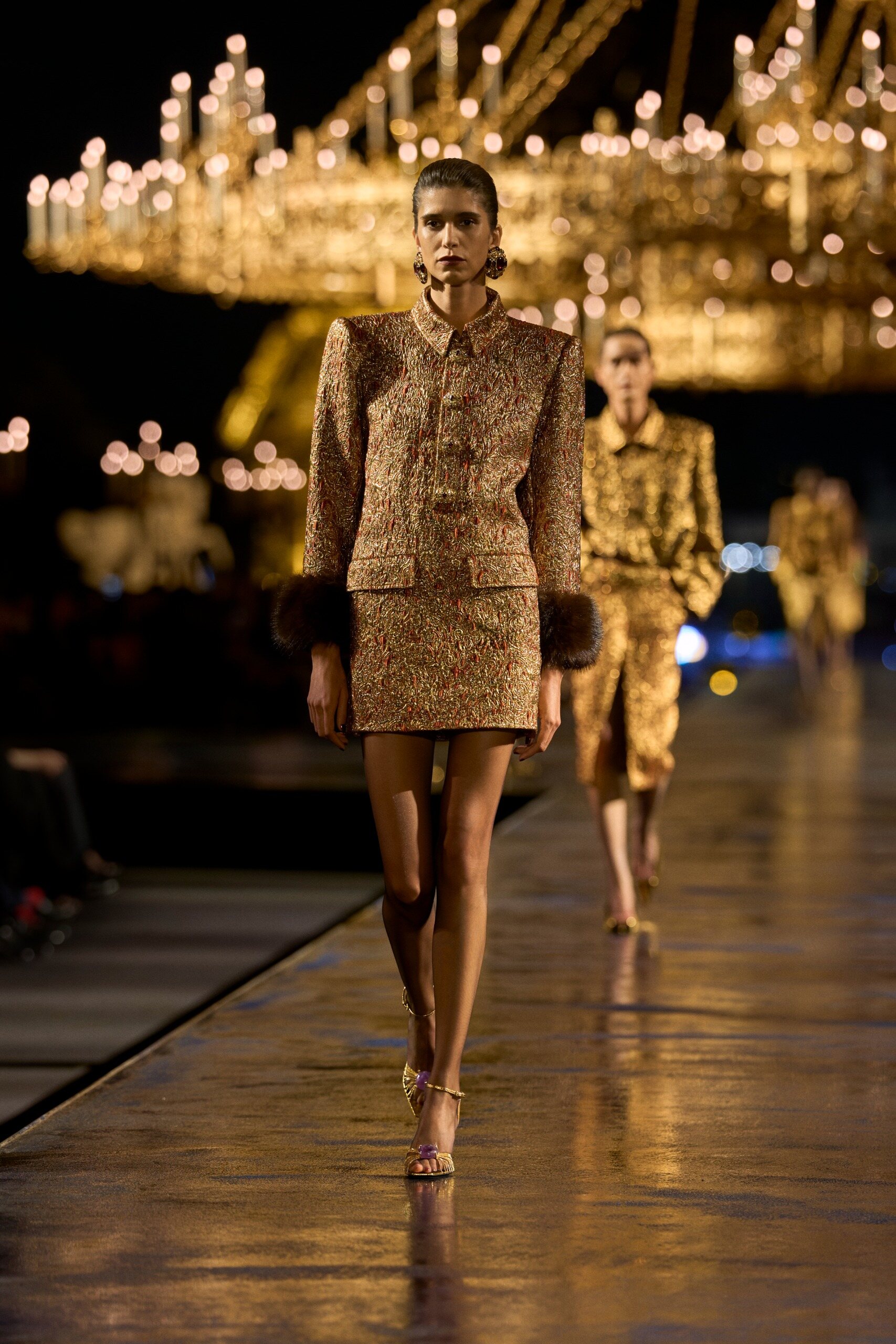 Saint Laurent gold mini dress with a pale chiffon cravat