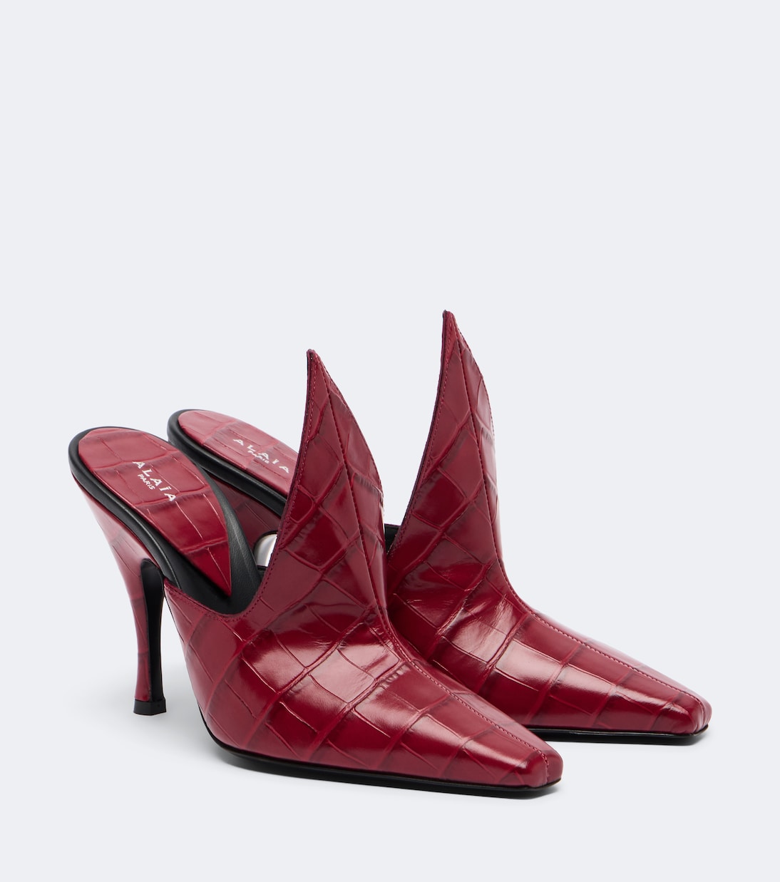 Red Alaïa croc-effect leather mules
